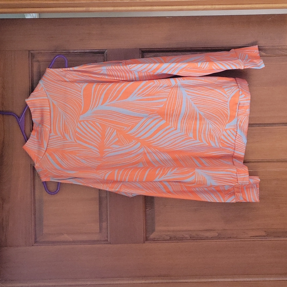 Excellent condition.  Worn once open shoulder top